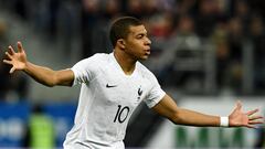 France&#039;s forward Kylian Mbappe celebrates after scoring a goal during an international friendly football match between Russia and France at the Saint Petersburg Stadium in Saint Petersburg on March 27, 2018. / AFP PHOTO / FRANCK FIFE