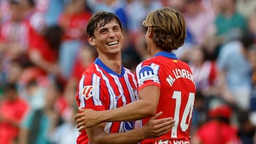 MADRID, 18/05/2025.- El defensa galo del Atl¨¦tico de Madrid Robin Le Normand (i) celebra tras marcar el segundo gol del equipo durante el partido de la jornada 37 de LaLiga entre el Atl¨¦tico de Madrid y el Real Betis, este domingo en el estadio Metropolitano, en Madrid. EFE/ Mariscal