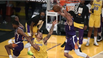 LOS ANGELES, CALIFORNIA - JUNE 03: Kyle Kuzma #0 of the Los Angeles Lakers reacts as he has his shot blocked by Devin Booker #1 and Mikal Bridges #25 of the Phoenix Suns in a 113-100 Suns win during game six of the Western Conference first round series at Staples Center on June 03, 2021 in Los Angeles, California.   Harry How/Getty Images/AFP NOTE TO USER: User expressly acknowledges and agrees that, by downloading and or using this photograph, User is consenting to the terms and conditions of the Getty Images License Agreement.
 == FOR NEWSPAPERS, INTERNET, TELCOS &amp; TELEVISION USE ONLY ==