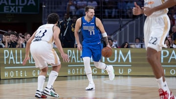 Luka Doncic, base de Dallas Mavericks, ante Sergio Llull, del Real Madrid.