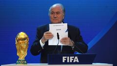 ZURICH, SWITZERLAND - DECEMBER 02: FIFA President Joseph S Blatter names Qatar as the winning hosts of 2022 duirng the FIFA World Cup 2018 & 2022 Host Countries Announcement at the Messe Conference Centre on December 2, 2010 in Zurich, Switzerland.  (Photo by Laurence Griffiths/Getty Images)