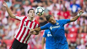 BILBAO, SPAIN - AUGUST 20: Faycal Fajr of Getafe CF competes for the ball with Mikel San Jose of Athletic Club during the La Liga match between Athletic Club and Getafe at at San Mames Stadium on August 20, 2017 in Bilbao, . (Photo by Juan Manuel Serrano Arce/Getty Images)