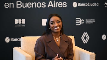 US Olympic gymnast Simone Biles smiles during a press conference at the Buenos Aires City Government headquarters on October 8, 2025, as part of her visit to Argentina to deliver a motivational talk titled "The Power of Believing." (Photo by Luis ROBAYO / AFP)