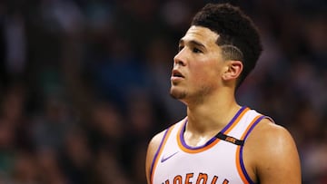 BOSTON, MA - DECEMBER 2: Devin Booker #1 of the Phoenix Suns looks on during the first half at TD Garden on December 2, 2017 in Boston, Massachusetts.   Maddie Meyer/Getty Images/AFP
 == FOR NEWSPAPERS, INTERNET, TELCOS &amp; TELEVISION USE ONLY ==