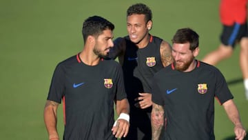 Luis Suarez has described playing alongside Neymar and Lionel Messi as "one of the best moments" he has experienced.