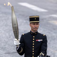How will the Olympic flame be lit during the opening ceremony at Paris 2024?