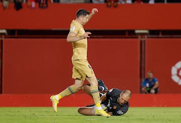 Robert Lewandowski y Predrag Rajkovic.