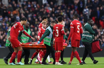 Liverpool's Ryan Gravenberch is carried off the pitch after suffering an injury during the EFL Carabao Cup final match between Chelsea and Liverpool at Wembley.
