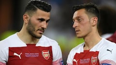 Two men charged with armed robbery over Özil and Kolasinac incident