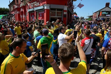 Brazil fans enjoy the pre match atmosphere outside the stadium prior to the friendly meeting with Croatia at Anfield