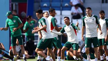 Soccer Football - FIFA World Cup Qatar 2022 - Mexico Training - Al Khor SC Stadium, Al Khor, Qatar - November 29, 2022  Mexico's Luis Romo, Raul Jimenez and Johan Vasquez during training REUTERS/Siphiwe Sibeko