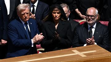 U.S President Donald Trump and first lady Melania Trump attend the funeral Mass of Pope Francis in St. Peter's Square at the Vatican, April 26, 2025. REUTERS/Dylan Martinez TPX IMAGES OF THE DAY