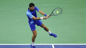 NEW YORK, NEW YORK - AUGUST 28: Novak Djokovic of Serbia returns a shot against Alexandre Muller of France during their Men's Singles First Round match on Day One of the 2023 US Open at the USTA Billie Jean King National Tennis Center on August 28, 2023 in the Flushing neighborhood of the Queens borough of New York City.   Clive Brunskill/Getty Images/AFP (Photo by CLIVE BRUNSKILL / GETTY IMAGES NORTH AMERICA / Getty Images via AFP)