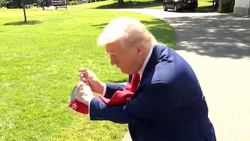 Trump takes a golf swing and cracks Pope joke at press meeting