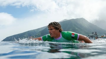 Mexico's Alan Cleland Quinonez paddels out in the 6th heat of the men's surfing round 1, during the Paris 2024 Olympic Games, in Teahupo'o, on the French Polynesian Island of Tahiti, on July 27, 2024. (Photo by Ben Thouard / POOL / AFP)