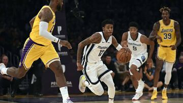LOS ANGELES, CA - OCTOBER 29: Ja Morant #12 of the Memphis Grizzlies drives against LeBron James #23 of the Los Angeles Lakers during the second half of the basketball game at Staples Center on October 29, 2019 in Los Angeles, California. NOTE TO USER: User expressly acknowledges and agrees that, by downloading and/or using this Photograph, user is consenting to the terms and conditions of the Getty Images License Agreement.  Kevork Djansezian/Getty Images/AFP
 == FOR NEWSPAPERS, INTERNET, TELCOS &amp; TELEVISION USE ONLY ==
