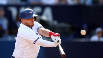 TORONTO, ON - APRIL 15: Alejandro Kirk #42 of the Toronto Blue Jays hits an RBI single in the seventh inning against the Tampa Bay Rays at Rogers Centre on April 15, 2023 in Toronto, Ontario, Canada. All players are wearing the number 42 in honor of Jackie Robinson Day.   Vaughn Ridley/Getty Images/AFP (Photo by Vaughn Ridley / GETTY IMAGES NORTH AMERICA / Getty Images via AFP)