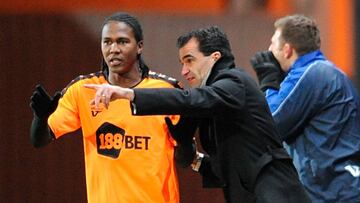 Wigan Athletic&#039;s Hugo Rodallega (left) talks to manager Roberto Martinez (right) on the touchline.   (Photo by Clint Hughes/PA Images via Getty Images)