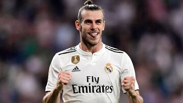 Real Madrid's Welsh forward Gareth Bale celebrates after scoring a goal during the Spanish League football match between Real Madrid and Getafe at the Santiago Bernabeu stadium in Madrid on August 19, 2018. (Photo by JAVIER SORIANO / AFP)