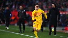 GIRONA, SPAIN - JANUARY 28: Gavi of FC Barcelona runs with the ball during the LaLiga Santander match between Girona FC and FC Barcelona at Montilivi Stadium on January 28, 2023 in Girona, Spain. (Photo by David Ramos/Getty Images)