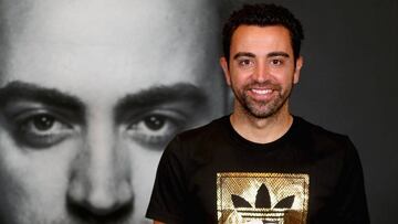 DUBAI, UNITED ARAB EMIRATES - NOVEMBER 23: Spanish football legend Xavi opens adidas zone in the new flagship Go-Sports Store in the Mall of Emirates Dubai. One of the greatest footballers of all time met with adidas competition winners and showcased his talents in adidas skills cage on November 23, 2015 in Dubai, United Arab Emirates. (Photo by Francois Nel/Getty Images for adidas) XAVI HERNANDEZ