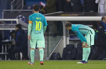 Leo Messi (left) and Jordi Alba react during their 4-0 defeat to Paris Saint-Germain.