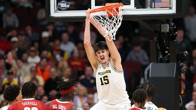 The No. 1 seeded Michigan Wolverines continue their March Madness journey tonight and one player sticks out on the team for his size and talent.