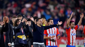 Girona's Spanish coach Michel (C) celebrates victory at the end of the Spanish league football match between Girona FC and Club Atletico de Madrid  at the Montilivi stadium in Girona on January 3, 2024. Girona won 4-3. (Photo by Pau BARRENA / AFP)