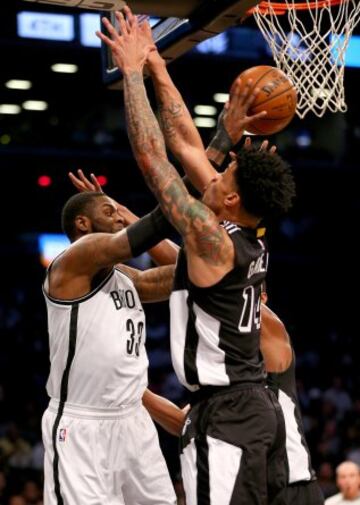 Willie Reed y Gerald Green.