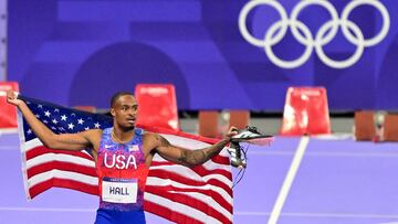US' Quincy Hall celebrates after winning the men's 400m final of the athletics event at the Paris 2024 Olympic Games at Stade de France in Saint-Denis, north of Paris, on August 7, 2024. (Photo by Martin BERNETTI / AFP)
