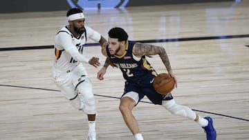 July 30, 2020; Lake Buena Vista, USA;  New Orleans Pelicans&#039; Lonzo Ball (2) heads to the basket past Utah Jazz&#039;s Mike Conley during the second half of an NBA basketball game. Mandatory Credit: Ashley Landis/Pool Photo via USA TODAY Sports