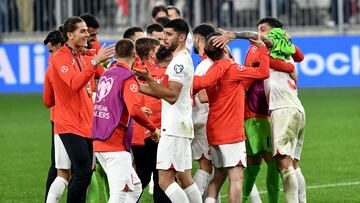 Turkey's players celebrate their victory against Croatia in their UEFA Euro 2024 Group D qualification football match at the OPUS Arena Stadium in Osijek, on October 12, 2023. (Photo by Denis LOVROVIC / AFP)