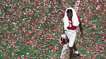 (FILES) Khyree Jackson of the Alabama Crimson Tide walks off the field after losing to the Georgia Bulldogs 33-18 in the 2022 CFP National Championship Game at Lucas Oil Stadium on January 10, 2022 in Indianapolis, Indiana. Minnesota Vikings rookie cornerback Jackson and two others were killed in an early-morning car crash in suburban Washington, the Maryland State Police said on July 7, 2024. He was 24. Jackson, selected by the Vikings in the fourth round of the 2024 NFL Draft, was a front-seat passenger in a Dodge Charger and pronounced dead on the scene by emergency medical personnel in a three-car incident at Upper Marlboro, Maryland. (Photo by Dylan Buell / GETTY IMAGES NORTH AMERICA / AFP)