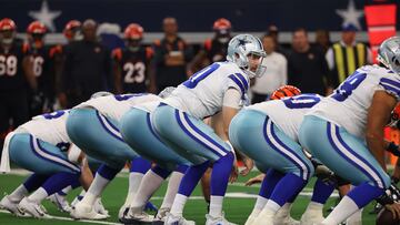 ARLINGTON, TEXAS - SEPTEMBER 18: Cooper Rush #10 of the Dallas Cowboys prepares to snap the ball against the Cincinnati Bengals during the second half at AT&T Stadium on September 18, 2022 in Arlington, Texas.   Richard Rodriguez/Getty Images/AFP