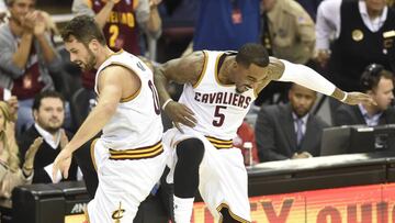 Nov 23, 2016; Cleveland, OH, USA; Cleveland Cavaliers forward Kevin Love (0) and guard J.R. Smith (5) celebrate a three point basket in the first quarter against the Portland Trail Blazers at Quicken Loans Arena. Mandatory Credit: David Richard-USA TODAY Sports