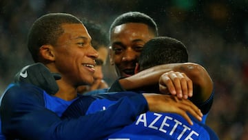Soccer Football - International Friendly - Germany vs France - RheinEnergieStadion, Cologne, Germany - November 14, 2017 France's Alexandre Lacazette celebrates scoring their second goal with Kylian Mbappe and Anthony Martial REUTERS/Thilo Schmuelgen