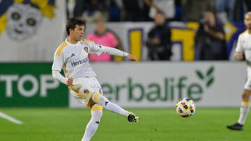 Feb 25, 2024; Carson, California, USA; LA Galaxy midfielder Riqui Puig (10) passes the ball against Inter Miami CF during the first half at Dignity Health Sports Park. Mandatory Credit: Jayne Kamin-Oncea-USA TODAY Sports