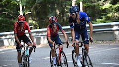 Groupama - FDJ's French rider Thibault Pinot (R), INEOS - Grenadiers' British rider Thomas Pidcock (C) and Team Arkea - Samsic's French rider Warren Barguil (L) cycle in the ascent of the Col du Platzerwasel in the final kilometres of the 20th stage of the 110th edition of the Tour de France cycling race 133 km between Belfort and Le Markstein Fellering, in Eastern France, on July 22, 2023. (Photo by Marco BERTORELLO / AFP)