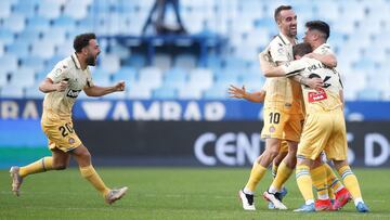 ZARAGOZA, SPAIN - MAY 08: Sergi Darder, Pol Lozano, Keidi Bare of RCD Espanyol celebrates the promotion to the first division league during the Liga Smartbank match betwen Real Zaragoza and RCD Espanyol at La Romareda on May 08, 2021 in Zaragoza, Spain. S