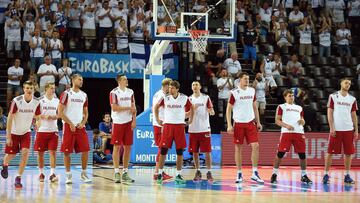 Russia&#039;s players stand in a line before the group A qualification basketball match between Finland and Russia at the EuroBasket 2015 in Montpellier on September 7, 2015. AFP PHOTO / PASCAL GUYOT