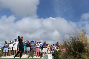 Tiger hits one-over 73 in long-waited return