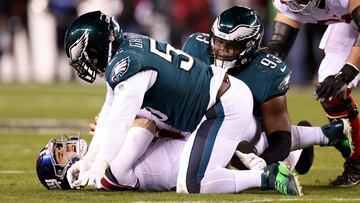 PHILADELPHIA, PENNSYLVANIA - JANUARY 21: Brandon Graham #55 of the Philadelphia Eagles sacks Daniel Jones #8 of the New York Giants during the fourth quarter of the game in the NFC Divisional Playoff game at Lincoln Financial Field on January 21, 2023 in Philadelphia, Pennsylvania.   Tim Nwachukwu/Getty Images/AFP (Photo by Tim Nwachukwu / GETTY IMAGES NORTH AMERICA / Getty Images via AFP)