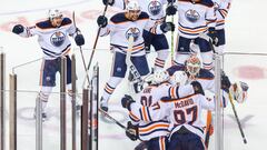 May 26, 2022; Calgary, Alberta, CAN; Edmonton Oilers center Connor McDavid (97) celebrates his goal with teammates during the first overtime period against the Calgary Flames in game five of the second round of the 2022 Stanley Cup Playoffs at Scotiabank Saddledome. Mandatory Credit: Sergei Belski-USA TODAY Sports