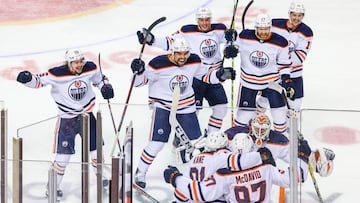 May 26, 2022; Calgary, Alberta, CAN; Edmonton Oilers center Connor McDavid (97) celebrates his goal with teammates during the first overtime period against the Calgary Flames in game five of the second round of the 2022 Stanley Cup Playoffs at Scotiabank Saddledome. Mandatory Credit: Sergei Belski-USA TODAY Sports