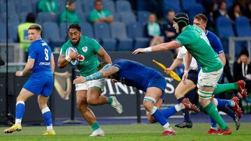 Rugby Union - Six Nations Championship - Italy v Ireland - Stadio Olimpico, Rome, Italy - February 25, 2023 Ireland's Bundee Aki in action with Italy's Niccolo Cannone REUTERS/Remo Casilli