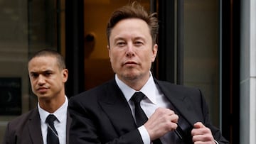 FILE PHOTO: Tesla CEO Elon Musk and his security detail depart the company?s local office in Washington, U.S. January 27, 2023.  REUTERS/Jonathan Ernst/File Photo