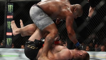 LAS VEGAS, NV - JULY 07:  Daniel Cormier punches Stipe Miocic in their UFC heavyweight championship fight during the UFC 226 event inside T-Mobile Arena on July 7, 2018 in Las Vegas, Nevada.  (Photo by Christian Petersen/Zuffa LLC/Zuffa LLC via Getty Imag