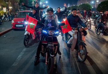 Locals celebrate in Marrakech after Morocco's victory over Ivory Coast in their FIFA 2018 World Cup Play-Off.