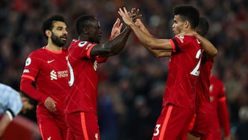LIVERPOOL, ENGLAND - APRIL 19: Sadio Mane of Liverpool celebrates scoring their side's third goal with teammate Luis Diaz during the Premier League match between Liverpool and Manchester United at Anfield on April 19, 2022 in Liverpool, England. (Pho