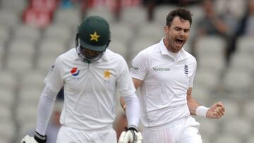 England&#039;s  James Anderson (R) celebrates taking the wicket of Pakistan&#039;s Shan Masood on the third day of the second Test cricket match between England and Pakistan at Old Trafford Cricket Ground in Manchester, England on July 24, 2016